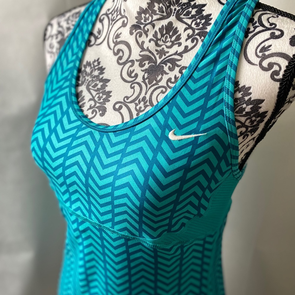 Nike runner’s top.